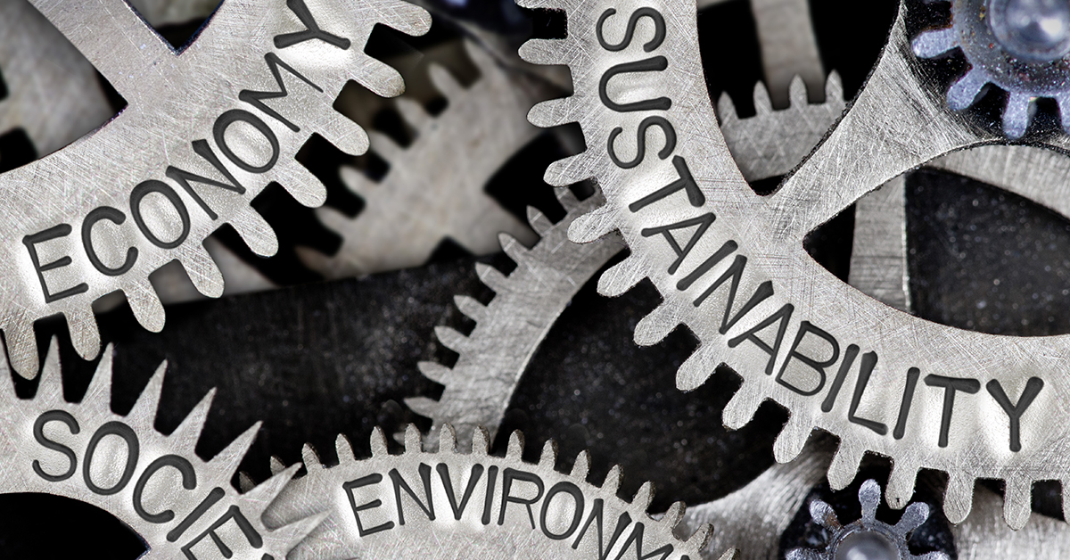 alt=" Gears With 'Economy' 'Sustainability, and 'Environment' On Each Spoke